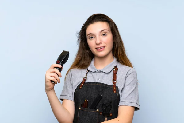 Jong Brunette Meisje Geïsoleerde Blauwe Achtergrond Met Kapper Kapper Jurk — Stockfoto