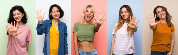 Zole Edilmiş Renkli Arka Planda Beş Parmaklı Kadın Grubu — Stok fotoğraf