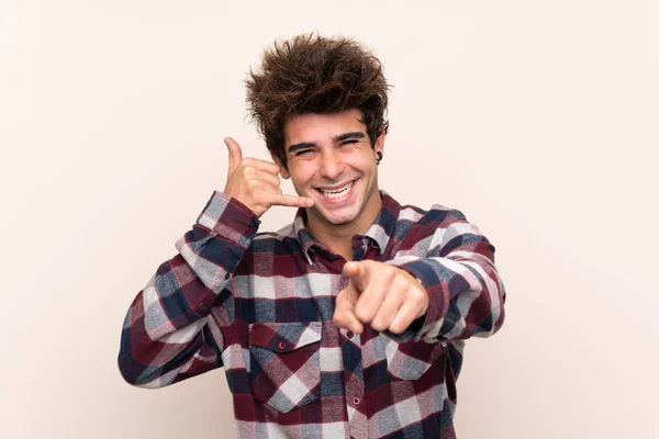 Young Caucasian Man Making Phone Gesture Pointing Front — Stock Photo, Image