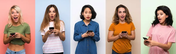 Conjunto Mulheres Sobre Fundo Colorido Isolado Surpreendido Enviando Uma Mensagem — Fotografia de Stock