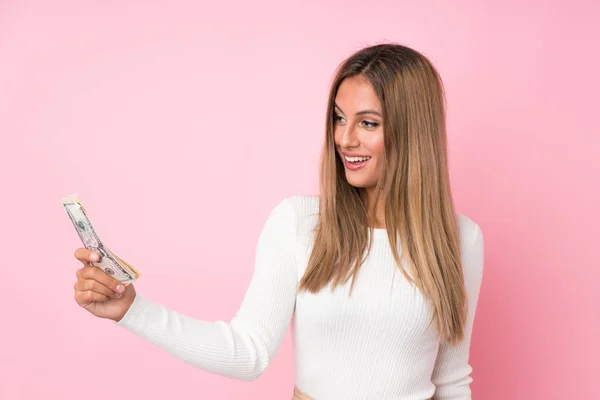 Young Blonde Woman Isolated Pink Background Taking Lot Money — Stock Photo, Image