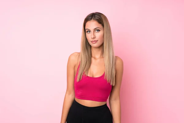 Junge Sport Blonde Frau Über Isolierte Rosa Hintergrund Stretching Arm — Stockfoto