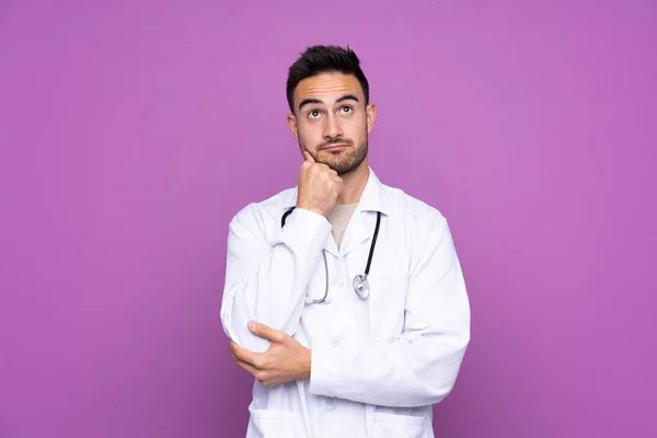 Young Man Wearing Doctor Gown Thinking — 图库照片