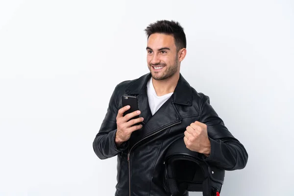 Homem Com Capacete Motocicleta Com Telefone Posição Vitória — Fotografia de Stock