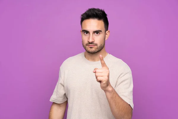 Young Handsome Man Isolated Purple Background Frustrated Pointing Front — 스톡 사진