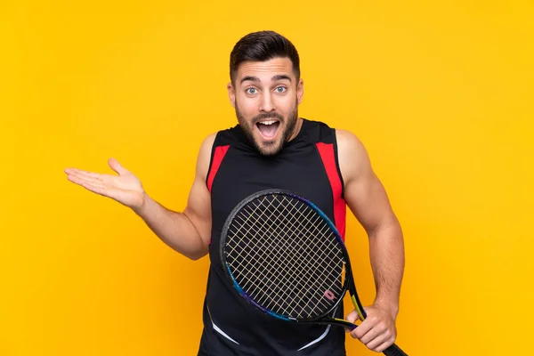 Tennis Player Man Isolated Yellow Wall Shocked Facial Expression — ストック写真