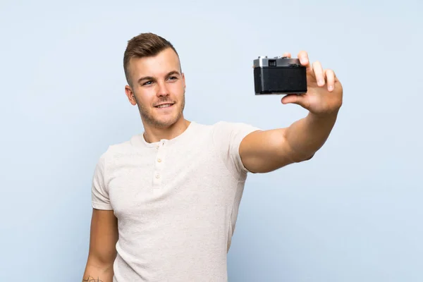 Young Handsome Blonde Man Isolated Blue Background Making Selfie — Stock Photo, Image