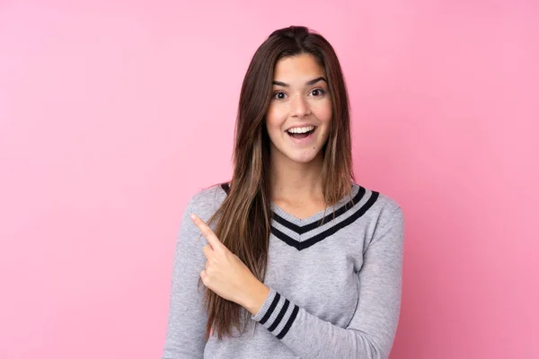 Teenager Girl Isolated Pink Background Pointing Finger Side — Stock Photo, Image