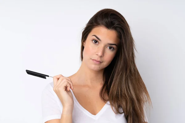 Menina Adolescente Sobre Fundo Isolado Com Pente Cabelo — Fotografia de Stock