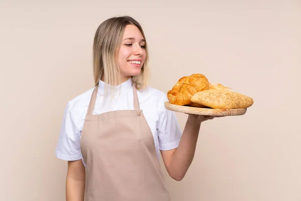 Young Blonde Girl Apron Female Baker Holding Table Several Breads — 스톡 사진