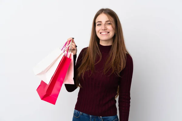 Jonge Vrouw Geïsoleerde Witte Achtergrond Houden Boodschappentassen Glimlachen — Stockfoto
