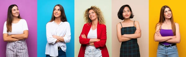 Uppsättning Kvinnor Över Isolerade Färgglada Bakgrund Tittar Upp Medan Leende — Stockfoto