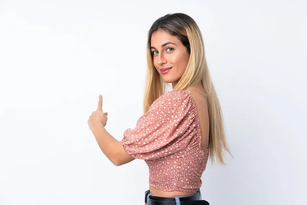 Jeune Femme Uruguayenne Sur Fond Blanc Isolé Pointant Vers Arrière — Photo