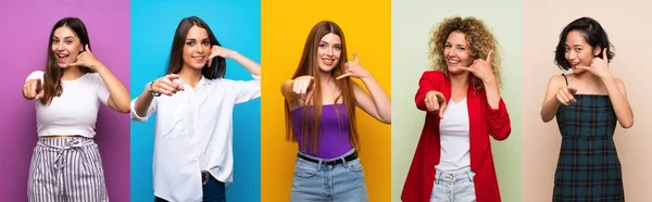 Frauen Vor Isoliertem Buntem Hintergrund Machen Handygesten Und Zeigen Nach — Stockfoto