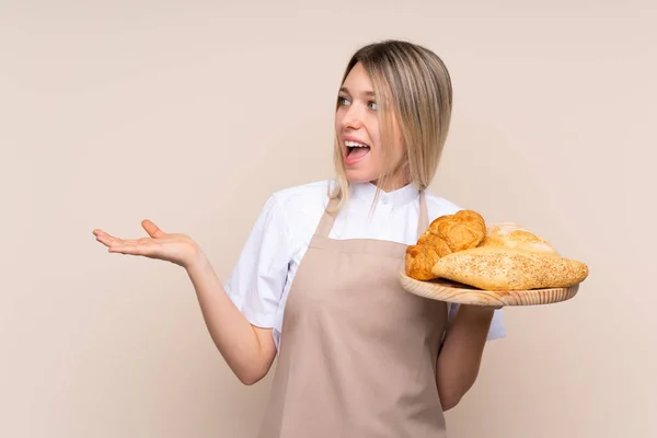 Young Blonde Girl Apron Female Baker Holding Table Several Breads — 스톡 사진