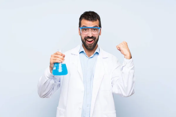 Young Scientific Holding Laboratory Flask Isolated Background Celebrating Victory Winner — 스톡 사진