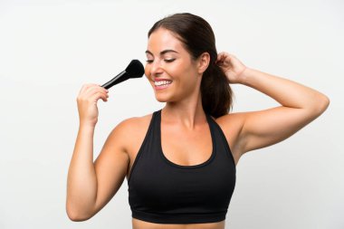 Makyaj fırçasıyla izole edilmiş beyaz arka plan