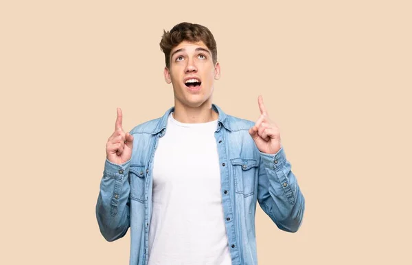 Handsome Young Man Surprised Pointing Isolated Background — 스톡 사진