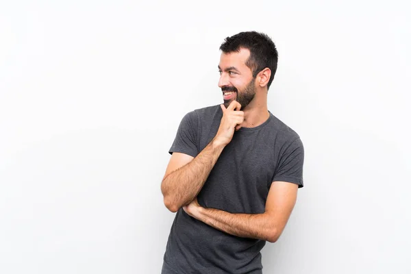 Jovem Homem Bonito Sobre Isolado Fundo Branco Olhando Para Lado — Fotografia de Stock