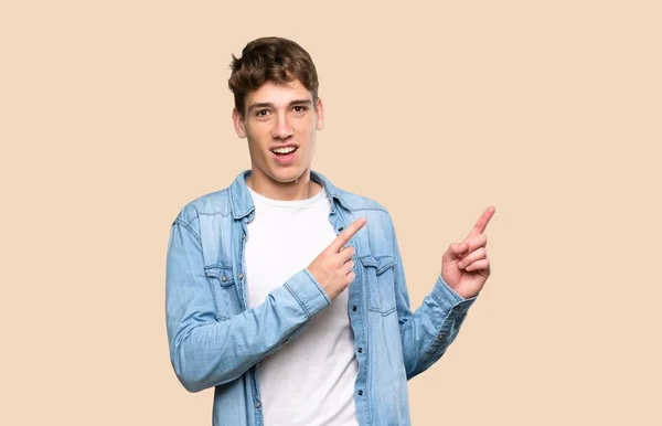 Handsome Young Man Frightened Pointing Side Isolated Background — 스톡 사진