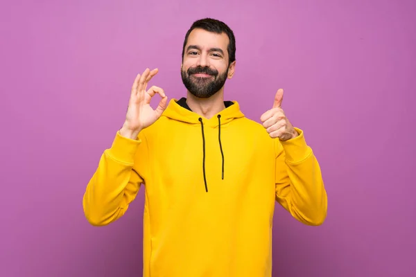 Handsome Man Yellow Sweatshirt Showing Sign Thumb Gesture — Stock Photo, Image