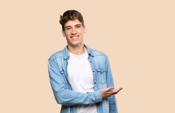 Handsome Young Man Presenting Idea While Looking Smiling Isolated Background — 스톡 사진