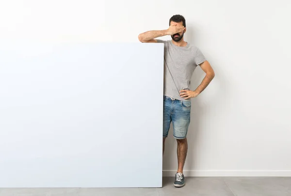Young Handsome Man Beard Holding Big Blue Empty Placard Covering — Stock Photo, Image