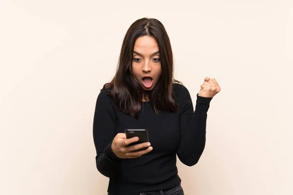 Young Brunette Woman White Sweater Isolated Background Surprised Sending Message — Stock Photo, Image