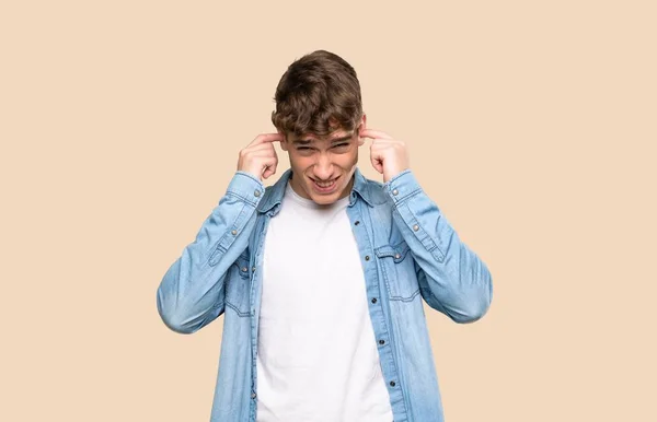 Handsome Young Man Frustrated Covering Ears Isolated Background — 스톡 사진