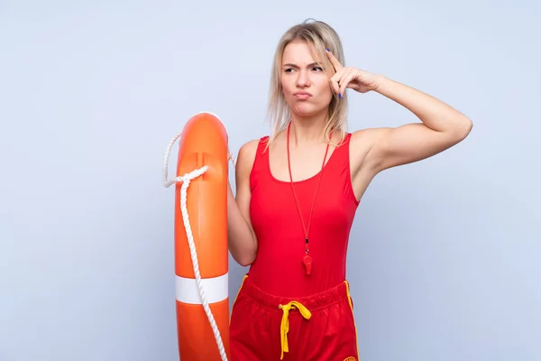 Lifeguard Woman Isolated Blue Background Lifeguard Equipment Having Doubts Confuse — 스톡 사진