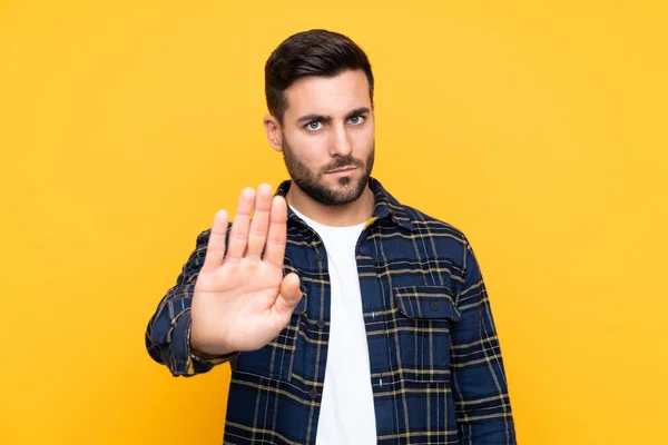 Young Handsome Man Beard Isolated Yellow Background Making Stop Gesture — 스톡 사진