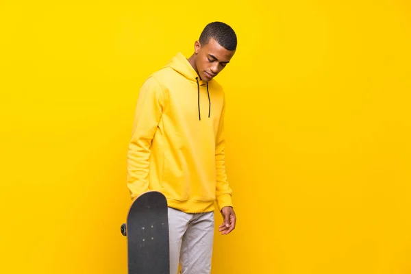 Afro American skater man over isolated white background — Stok Foto