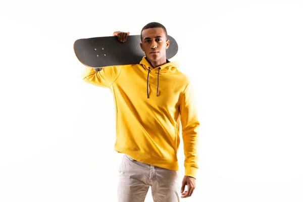 Afro American skater man over isolated white background — Stok Foto