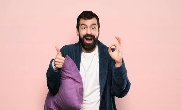 Man Beard Pajamas Showing Sign Thumb Gesture Isolated Pink Background — ストック写真