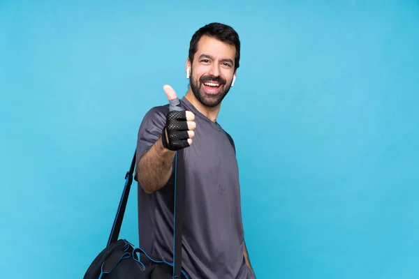 Young Sport Man Beard Isolated Blue Background Thumbs Because Something — Stok fotoğraf