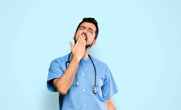 Surgeon Doctor Man Yawning Covering Wide Open Mouth Hand Isolated — Stockfoto