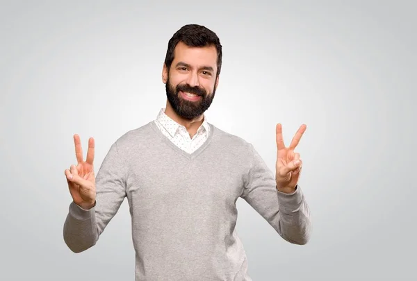 Handsome Man Showing Victory Sign Both Hands Isolated Grey Background — Stok fotoğraf