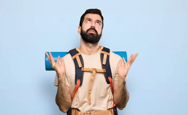 Hiker Man Frustrated Bad Situation Isolated Blue Background — ストック写真