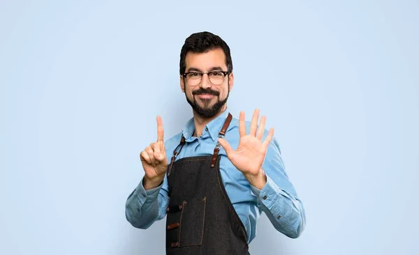 Man Apron Counting Six Fingers Isolated Blue Background — Stok fotoğraf