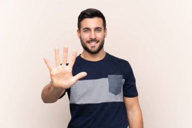 Sakallı, sakallı, genç ve yakışıklı bir adam.