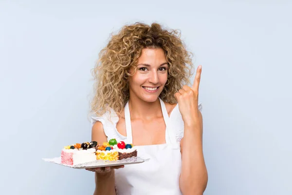 Young Blonde Woman Curly Hair Holding Lots Different Mini Cakes — Stock Photo, Image