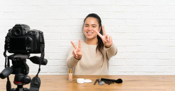 Young Blogger Asian Girl Recording Video Tutorial Smiling Showing Victory — Stockfoto