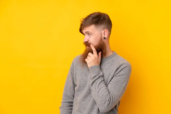 Redhead Man Long Beard Isolated Yellow Background Looking Side — Stock Photo, Image