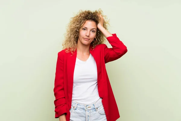 Young Blonde Woman Curly Hair Isolated Green Background Expression Frustration — Stock Photo, Image