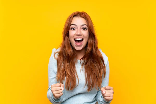 Teenager Redhead Girl Isolated Yellow Background Celebrating Victory Winner Position — 스톡 사진