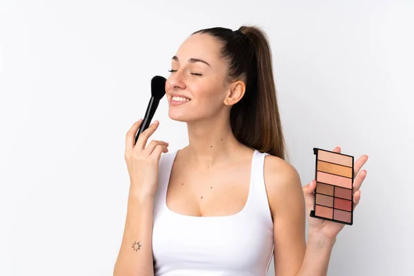 Junge Brünette Frau Über Isolierten Weißen Hintergrund Mit Make Palette — Stockfoto