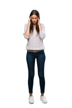 A full-length shot of a Young hispanic brunette woman with headache over isolated white background