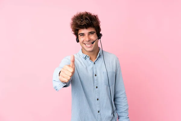 Young Caucasian Man Isolated Pink Background Working Headset Thumb — 图库照片