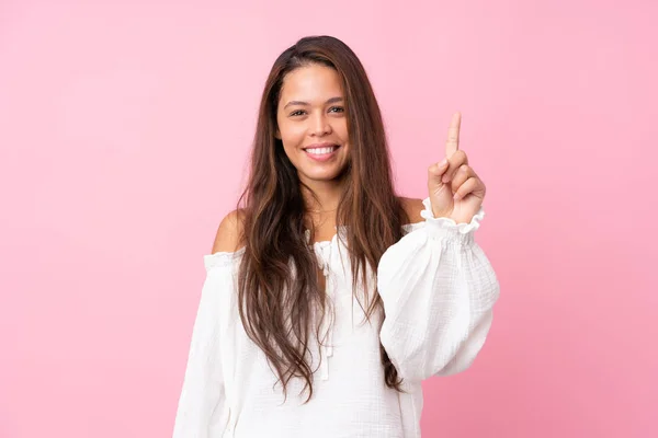 Young Brazilian Girl Isolated Pink Background Showing Lifting Finger Sign — ストック写真