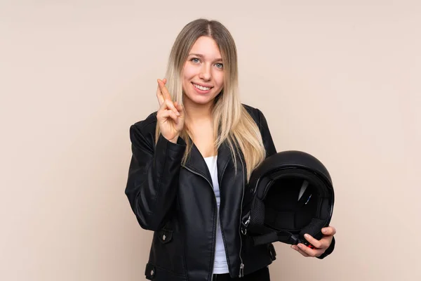 Young Blonde Woman Motorcycle Helmet Isolated Background Fingers Crossing — Stok fotoğraf